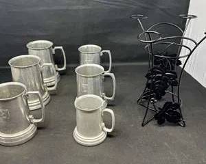 Lot 81  Vintage Pewter Beer Mugs with Iron Wine Holder Stand