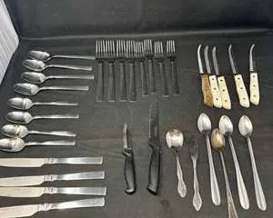 Lot 56  Mixed Flatware Set Including Stainless Steel and WoodHandled Knives