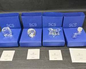Lot 14  Swarovski SCS Crystal Collection  Wild Horses, Orchid  Faceted Paperweights  Boxed