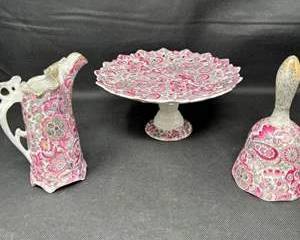 Lot 155  Royal Doulton Royal Paisley Pink Pattern Ceramic Pitcher, Bell, and Pedestal Plate Set