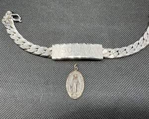 Lot 221  Vintage Sterling Silver Religious Medal and Personalized Bracelet