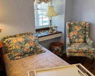 Custom upholstered bedding and wing chairs