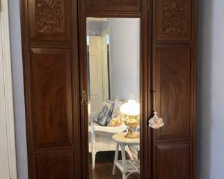 Edwardian carved wardrobe with mirrored door