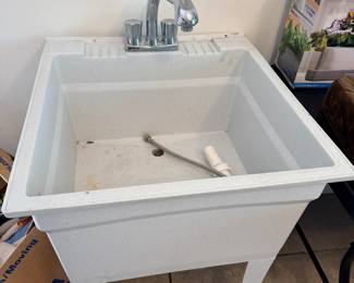 Utility sink with faucet