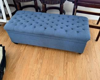 Upholstered storage ottoman