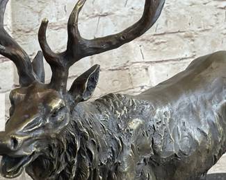 Solid bronze elk. Approximately 2 feet long.