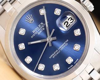 Rolex watch with diamond face. 40 mm.