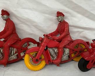 Three Toy Motorcycles: Two Auburn Rubber Motorcycles and One Plastic Motorcycle