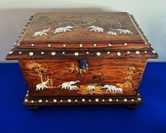 Gorgeous inlaid box featuring an elephant (bone) motif.