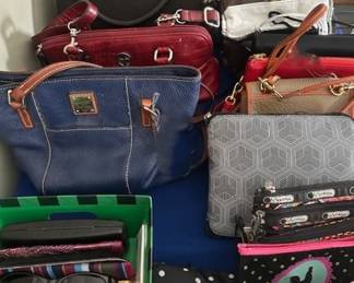 Several hand bags including Coach, Dooney & Bourke