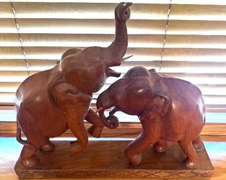 Vintage pair of carved wooden elephants. 17"wide x 15.5"high.