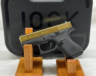  Glock 42 Semi-Automatic Pistol with Gold-Colored Slide, .380 Auto