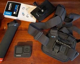 Go Pro Camera and bundle- includes chest mount/strap, bag & handle 