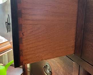 In excellent condition, draws work well. Bowed front, tapered legs carved details