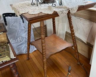 Oak two-tier square parlor side table with bobbin turned legs.