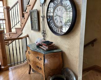 Clocks, ornate chest of drawers 