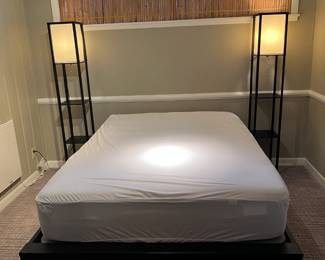 $130.   Full mattress on wood frame. A pair of metal lamps with  fabric shades.  10 in.² by 62.5 inches high. 