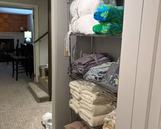 Bedding and bath linens, comforters, and blankets all for sale during in person shopping