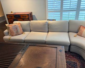 $800. Sectional sofa custom made by Rep Craftsman Inc. Seattle, Washington.   Left side is 117" to the middle of the curved corner piece.  Right side is 78" to the middle of the center piece.  It is 34"d x 25"h.  Comes in three sections for easy moving.  