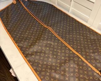 Double-sided Louis Vuitton hanging garment bag. “46 long. $600 available for in person purchase Friday and Saturday 