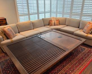 another view of the sectional and the coffee table listed in a following photo.