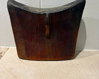 $180  Northern Africa wood headrest 8" x 6.5".  Purchased from the Lewis/Wara Gallery.