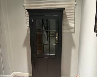 $190.  Cabinet with four shelves behind the glass door.   22.5"w x 16"d x 58 1/2 h.