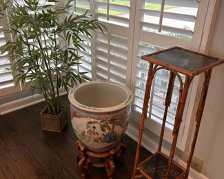 Famille Rose jardiniere on rosewood stand, potted bamboo, and bamboo and painted top plant stand.  For sale during in person shopping Friday and Saturday.