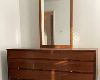 Nine drawer dresser with mirror and two matching nightstands 