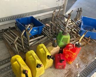 LOT OF FUEL CANS, LOCK BARS