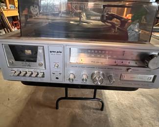 STEREO CONSOLE WITH CASSETTE, TURNTABLE AND 8 TRACK