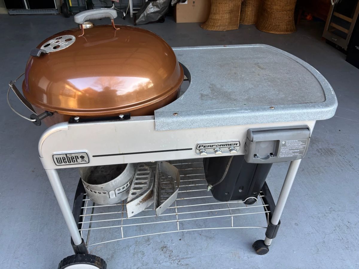 $220
Weber Performer Deluxe Charcoal Grill, 22-Inch, Touch-N-Go Gas Ignition System, Copper-$200