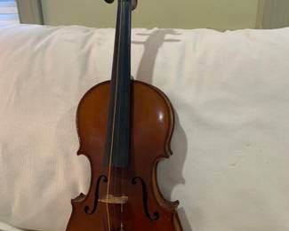 $1900
1917 string violin.  It comes with the original case, bow and chin guard. 
With the exception of needing to re-strung the violin is in very good condition.
The label inside the violin reads, "copia di Antonius Stradiuarius and Angela Ferrari,