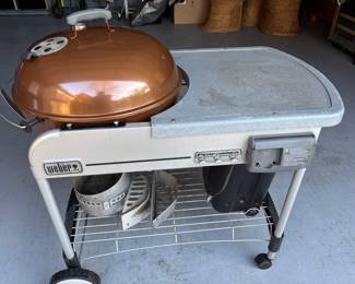 $220
Weber Performer Deluxe Charcoal Grill, 22-Inch, Touch-N-Go Gas Ignition System, Copper-$200