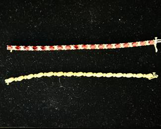 Gold bracelets with garnets and diamonds 