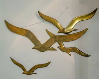 Vintage brass birds