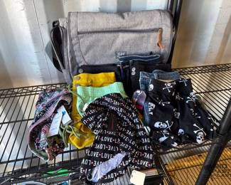 4006 Clothing Items and 1 Computer Bag