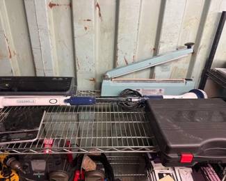 3516 Food Saver Vacuum Sealer, Uline Heat Sealer, Portable Gas Stove, Kitchen Scale, and a Casabella Battery powered Brush