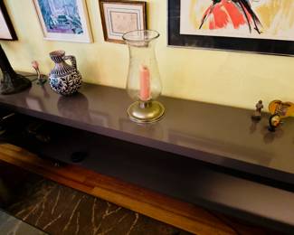 Long side table in grayish blue.