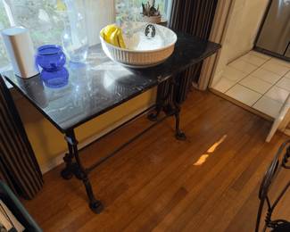 Side stone table with iron legs
