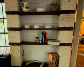 Works as a bookshelf, desk, or display area.