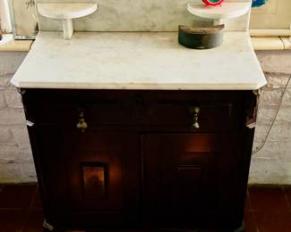 Antique chest with marble top. 