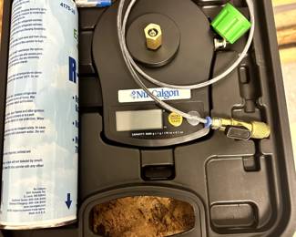 REFRIGERANT CHARGING SYSTEM