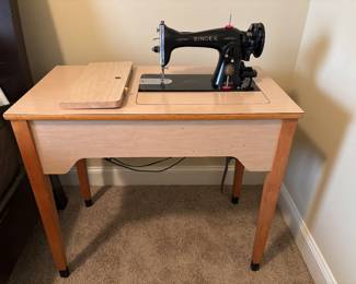 	#43	Vintage Singer Sewing Machine And Cabinet	 $45.00 				