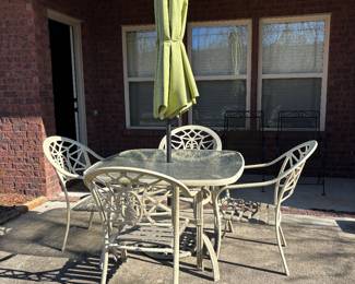 	#53	Patio Table With 4 Chairs And Umbrella	 $80.00 				