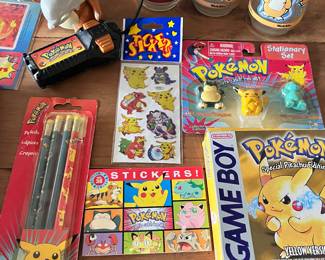 Pokemon pencils, stickers, Welch's glasses, Tomy Pokemon Cubone remote (as is). Pokemon Game Boy box only(Yellow Version)