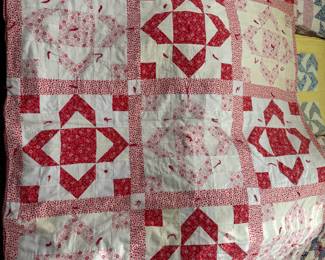 Vintage “Reds and Pinks” quilt. 
Pic 1 of 5  Measures approximately 8' x 88"