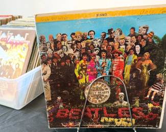 LPs: Led Zeppelin, Doors, Disney, Motown, jazz
CDs: classical
VHS: Star Wars Trilogy, Sense + Sensibility, Oprah, exercise
DVDs: Monarch of the Glen, Dirty Dancing, Spanish videos, dance/exercise