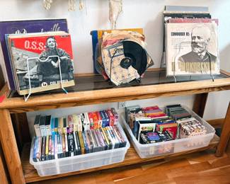 LPs: Led Zeppelin, Doors, Disney, Motown, jazz
CDs: classical
VHS: Star Wars Trilogy, Sense + Sensibility, Oprah, exercise
DVDs: Monarch of the Glen, Dirty Dancing, Spanish videos, dance/exercise