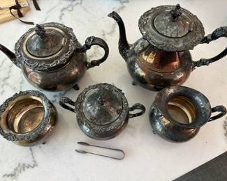 Vintage Silverplate Tea & Coffee Set
Includes teapot, coffee pot, sugar bowl, creamer & tongs.  "Silverplate – not sterling. Great for display or polishing.”